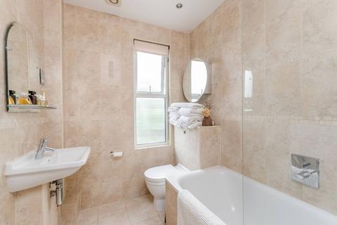 49 Nelson Road, London, SW19 1HS