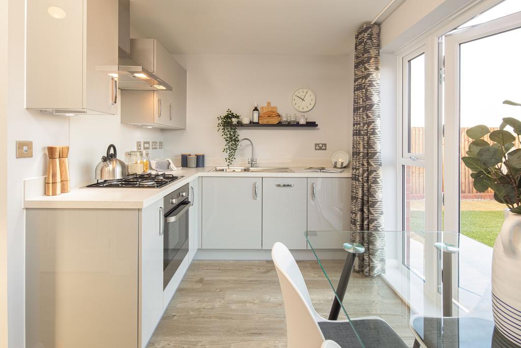 Open plan kitchen with dining area in the...