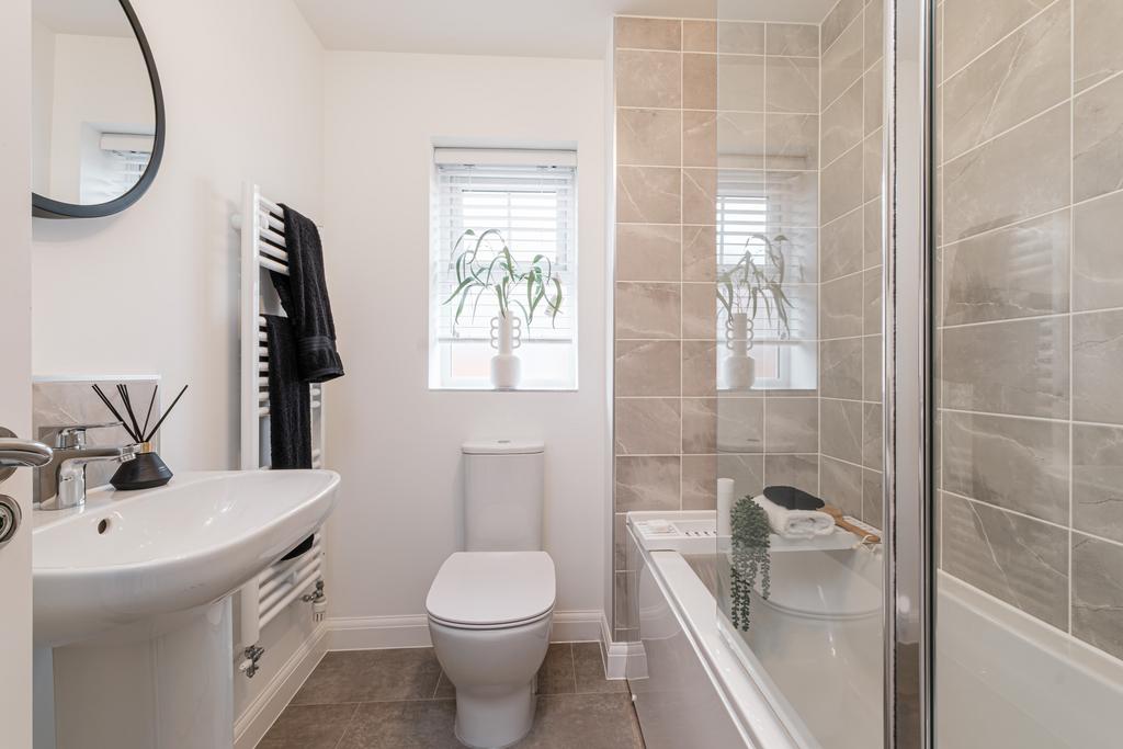 Grey bathroom in Plot 94 Archford