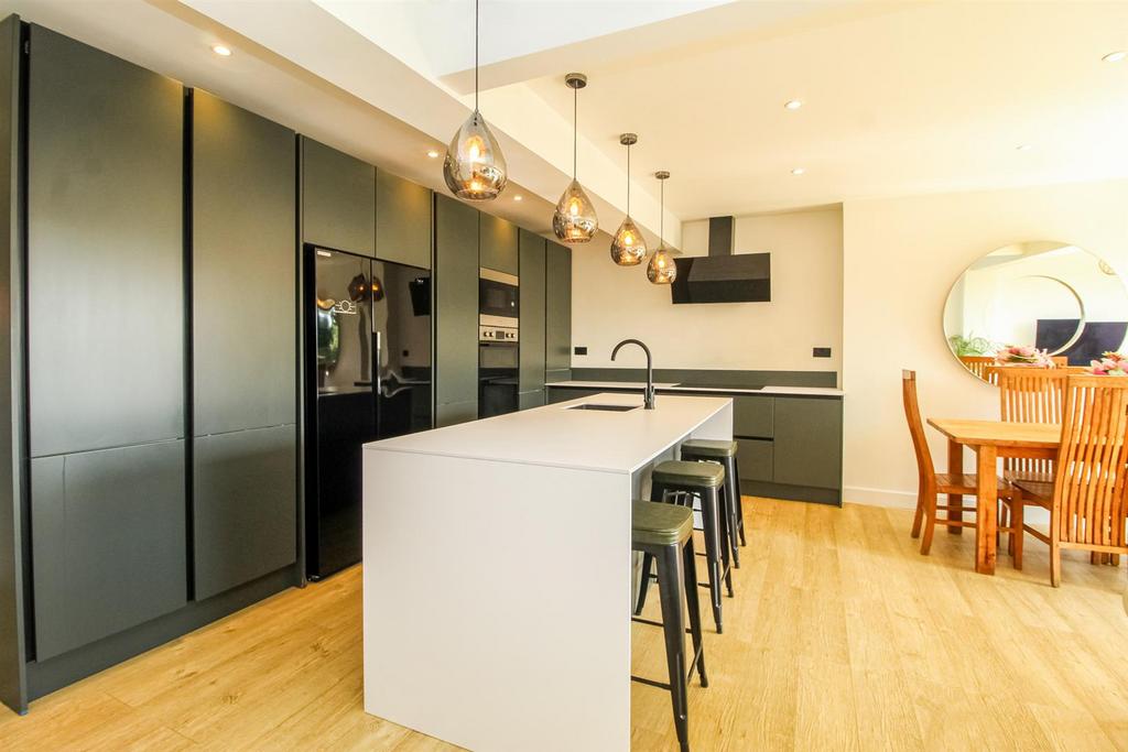 Open plan kitchen dining sitting