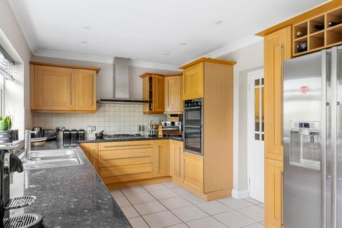 20 Downs Way, Epsom, KT18 5LU