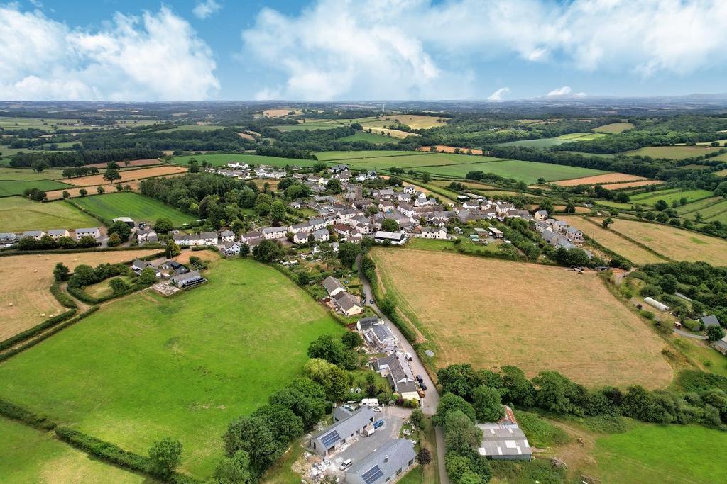 Aerial view of the village and location of The She