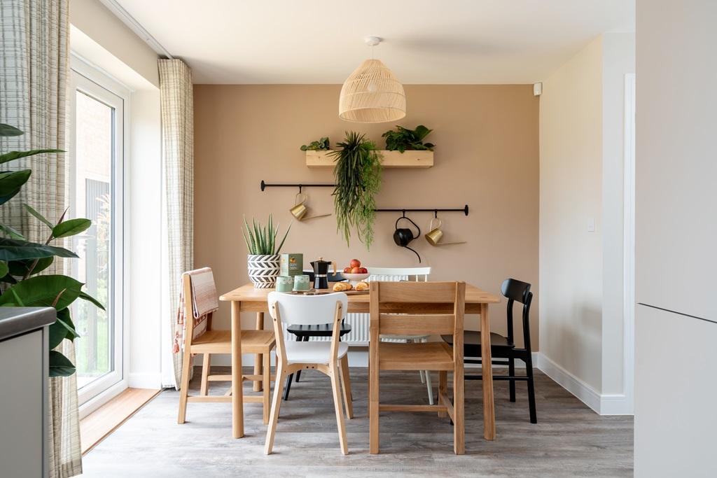 The open plan kitchen/diner boasts double doors...