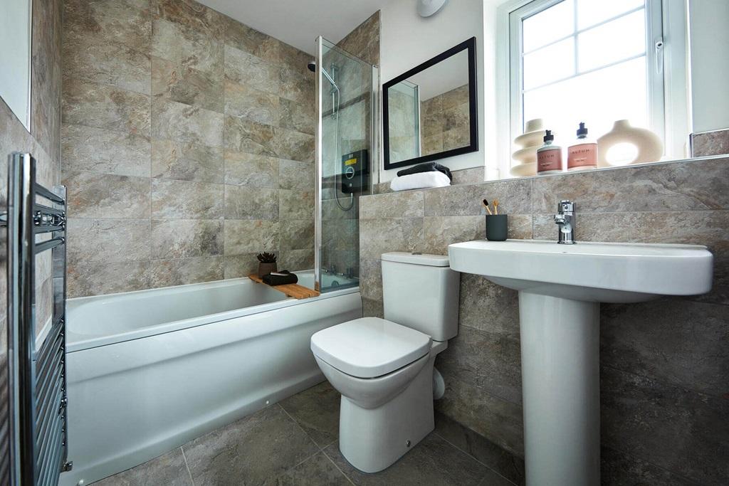 A spacious bathroom completes the apartment