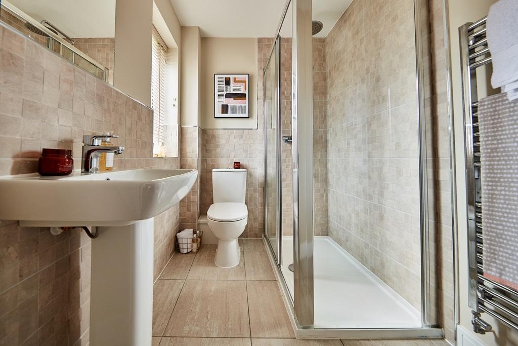 An en suite shower room helps beat the morning...