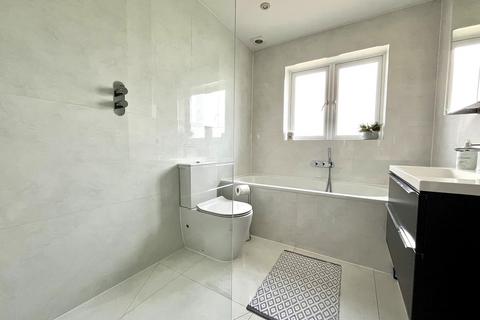 9 Moorfield Road, Chessington, KT9 1AU