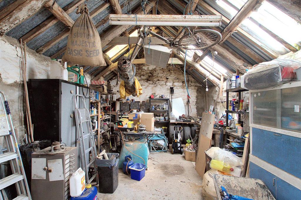 Inside Attached stone outbuilding/workshop