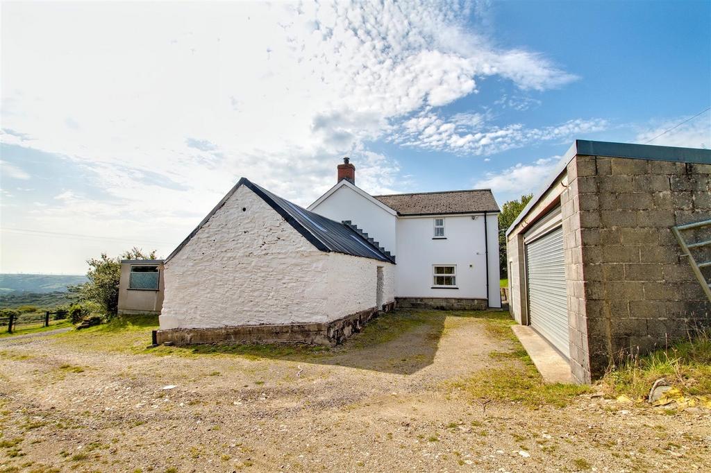 Attached stone outbuilding & Garage