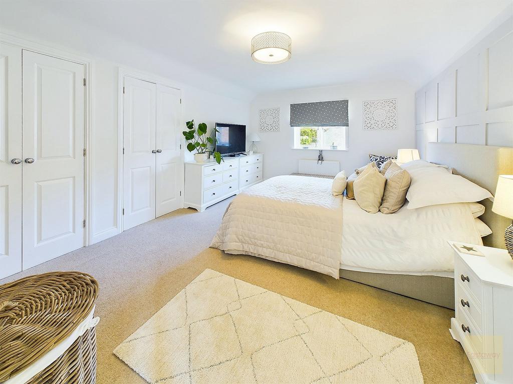 Principal bedroom with built in wardrobes