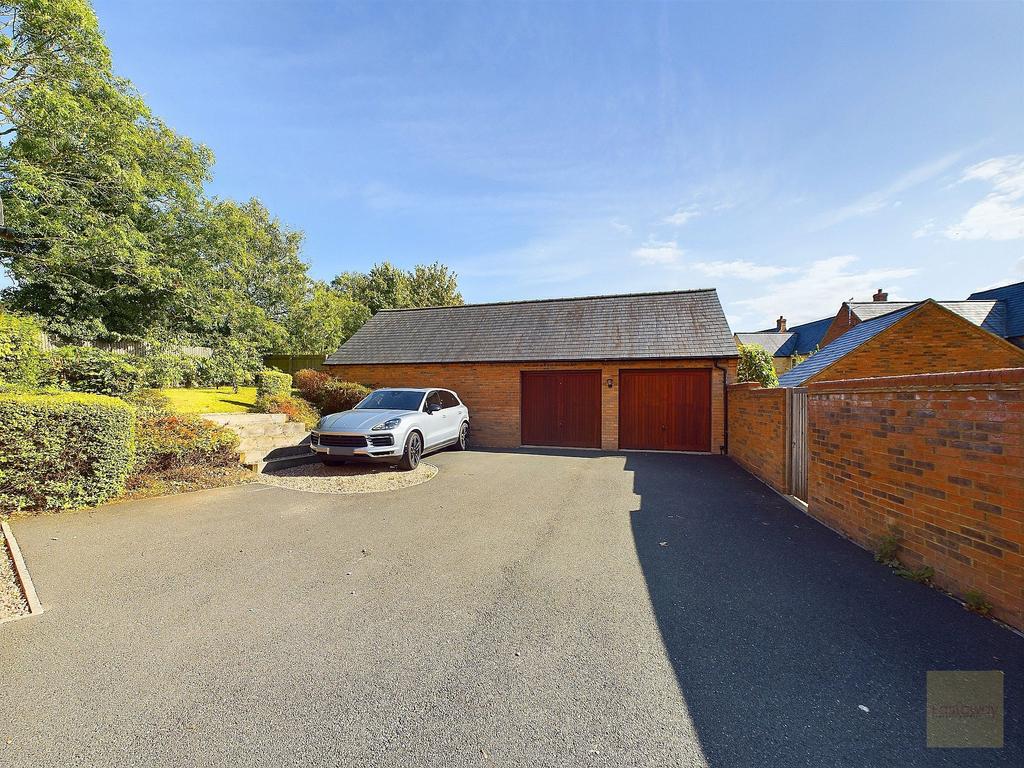 Double garage with driveway parking for...