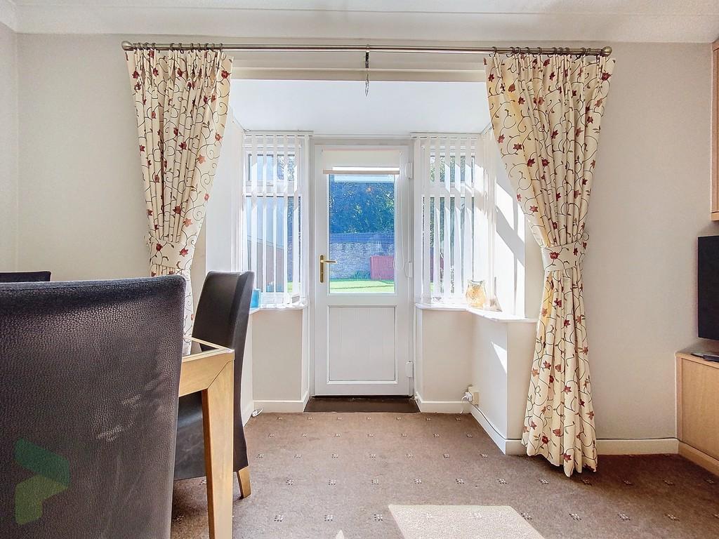 Living Room and Rear Entrance