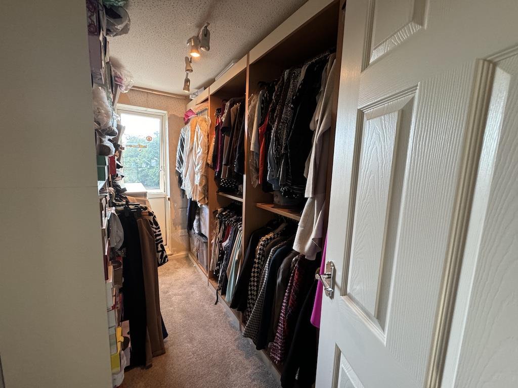 23 - Bedroom 3  Walk-In Dressing Room.jpg