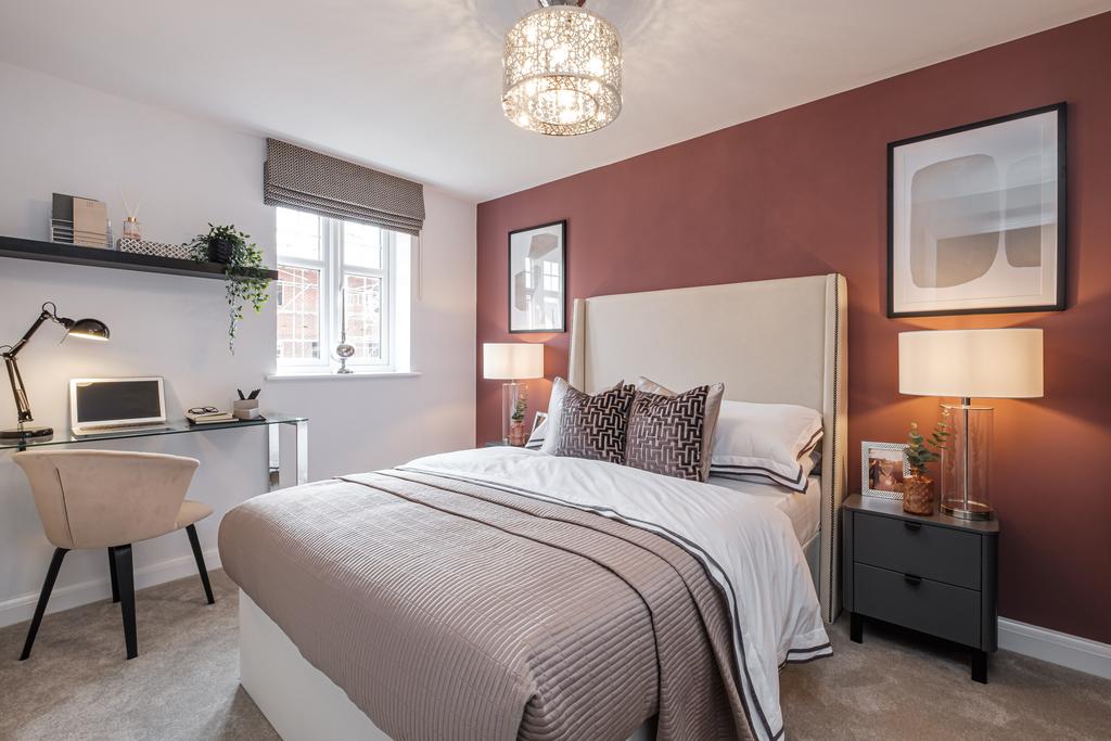 Double bedroom with dark pink wall