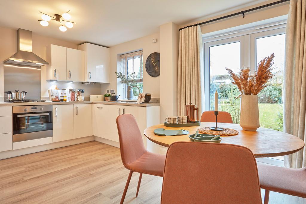 Open plan kitchen with dining area in the...