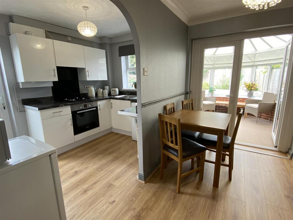 Separate dining area leading to Conservator