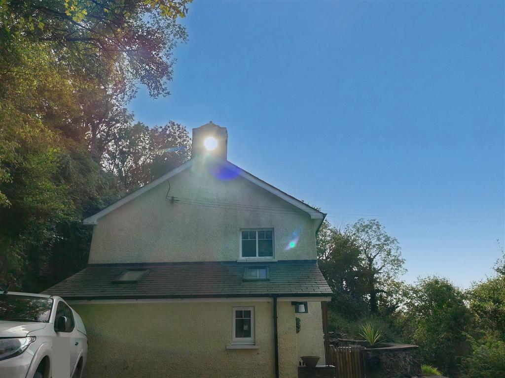 Sun shining through the old school bell tower