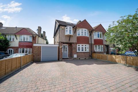 107 Churston Drive, Morden, SM4 4JE