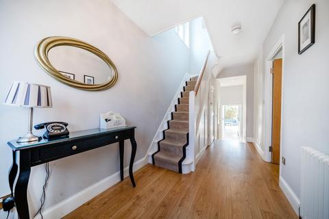 107 Churston Drive, Morden, SM4 4JE