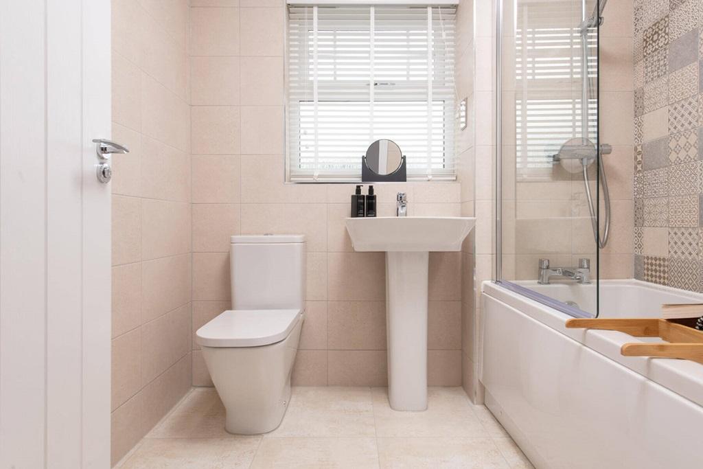 A family bathroom completes the home