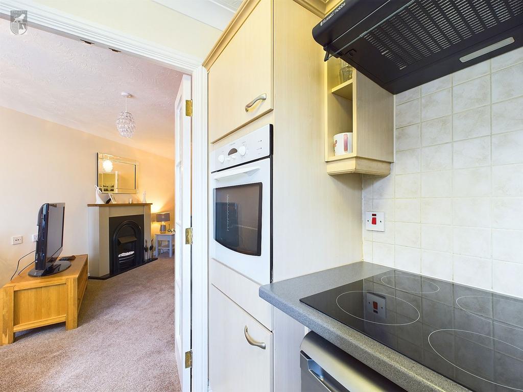 Kitchen looking onto the lounge