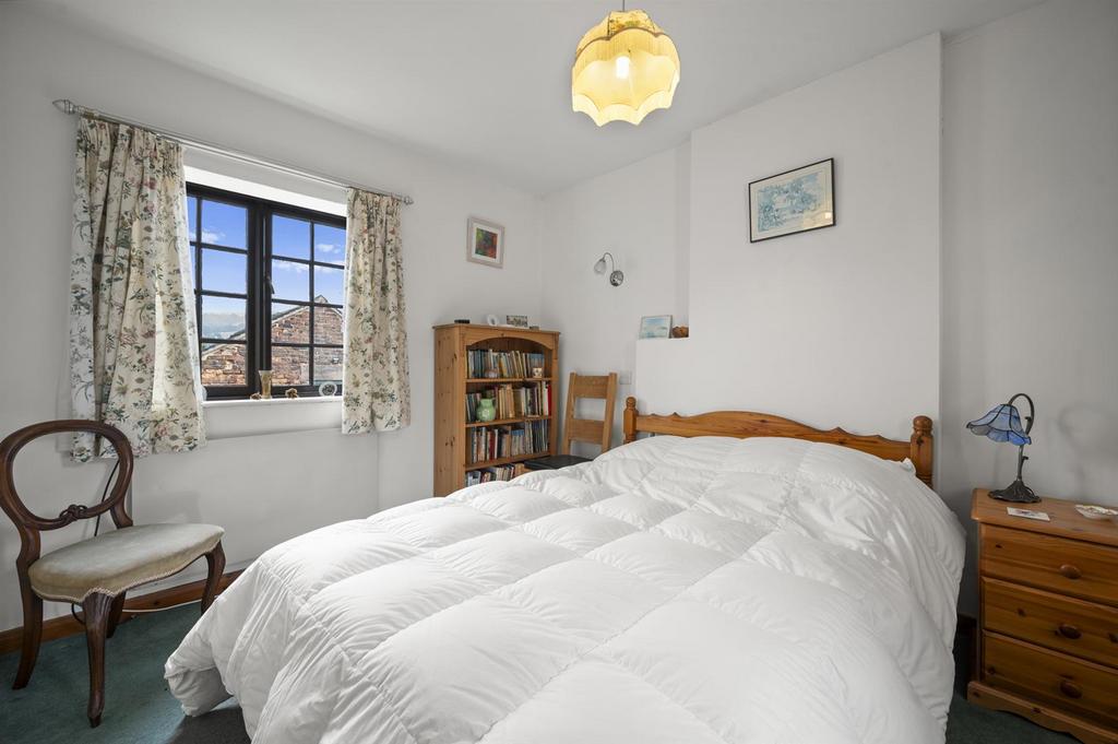Bedroom Three to front window.jpg