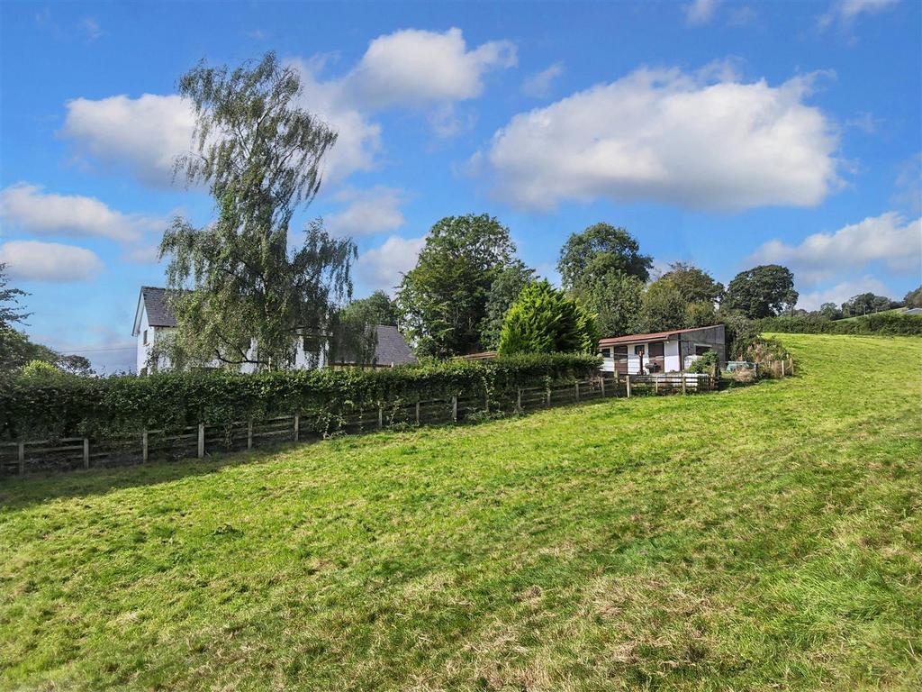 House and stables from paddock