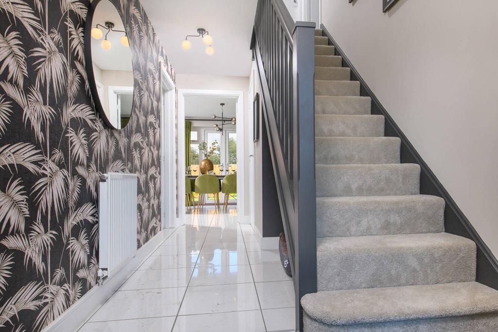 A welcoming hallway with storage cupboard