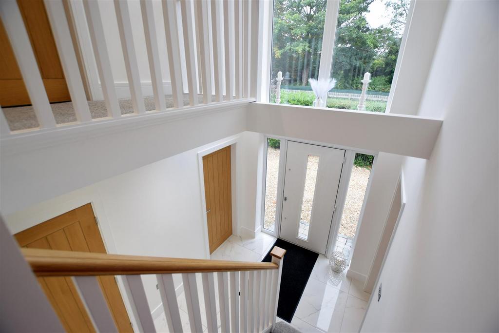 First floor view to entrance hall