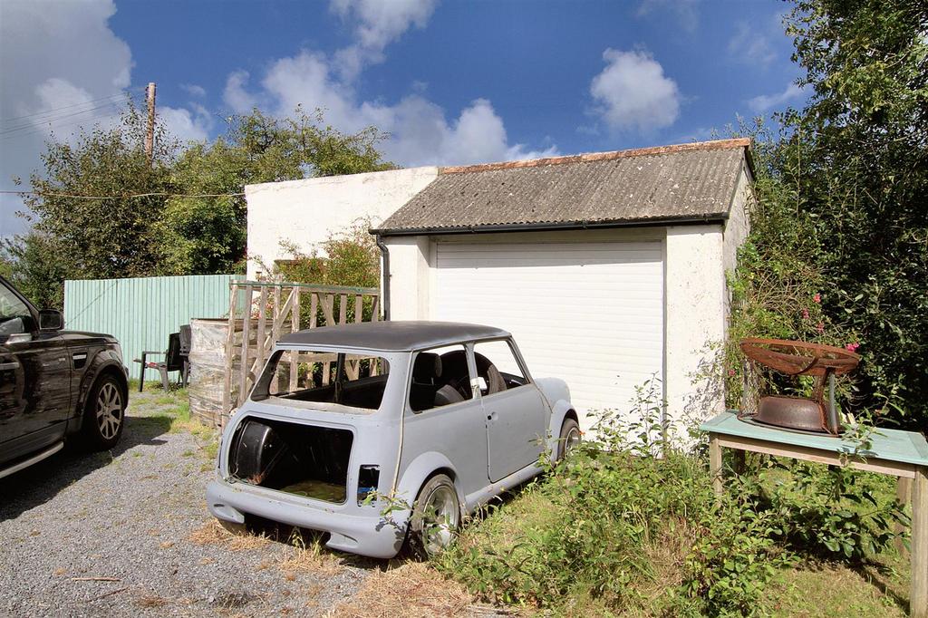 Detached garage and store shed