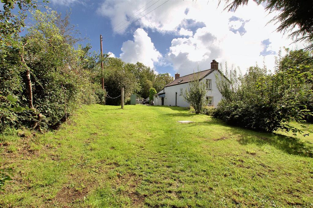 Rear garden and cottage