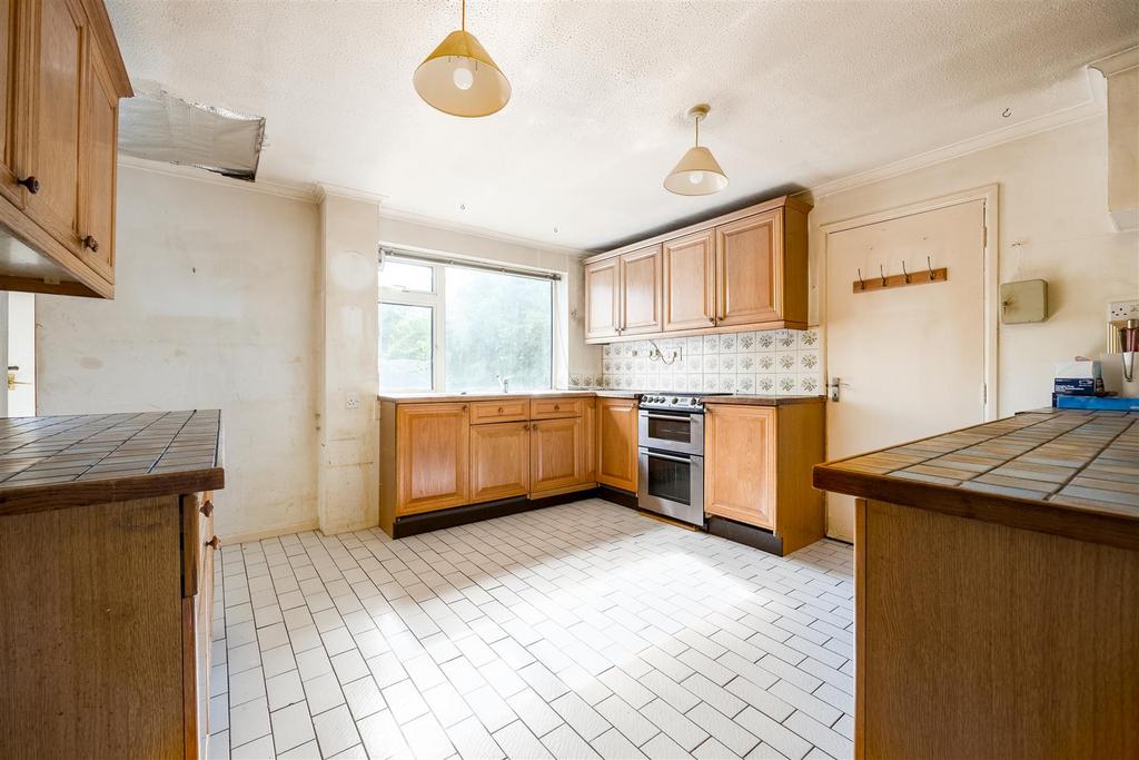 Kitchen with door to garage