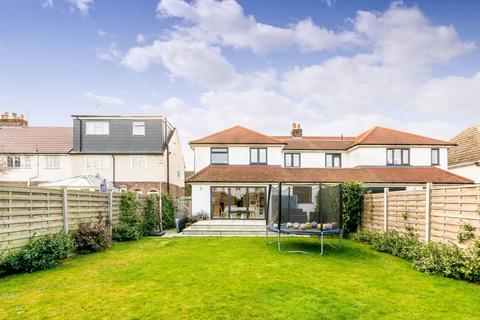 4 bedroom semi-detached house to rent, Lower Downs Road, Raynes Park, London, SW20