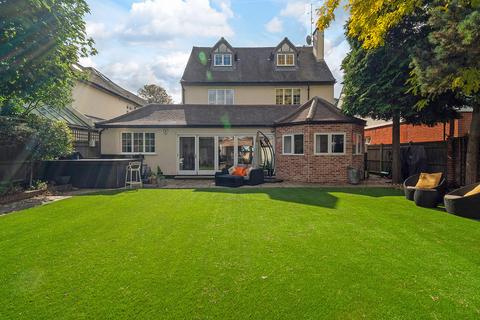 34 Copse Hill, London, SW20 0HG