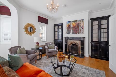 34 Copse Hill, London, SW20 0HG