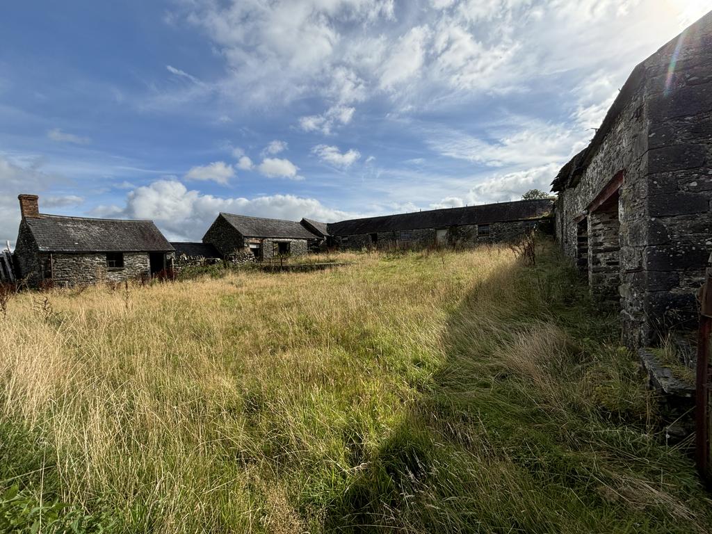 Courtyard of stone and slate buildings