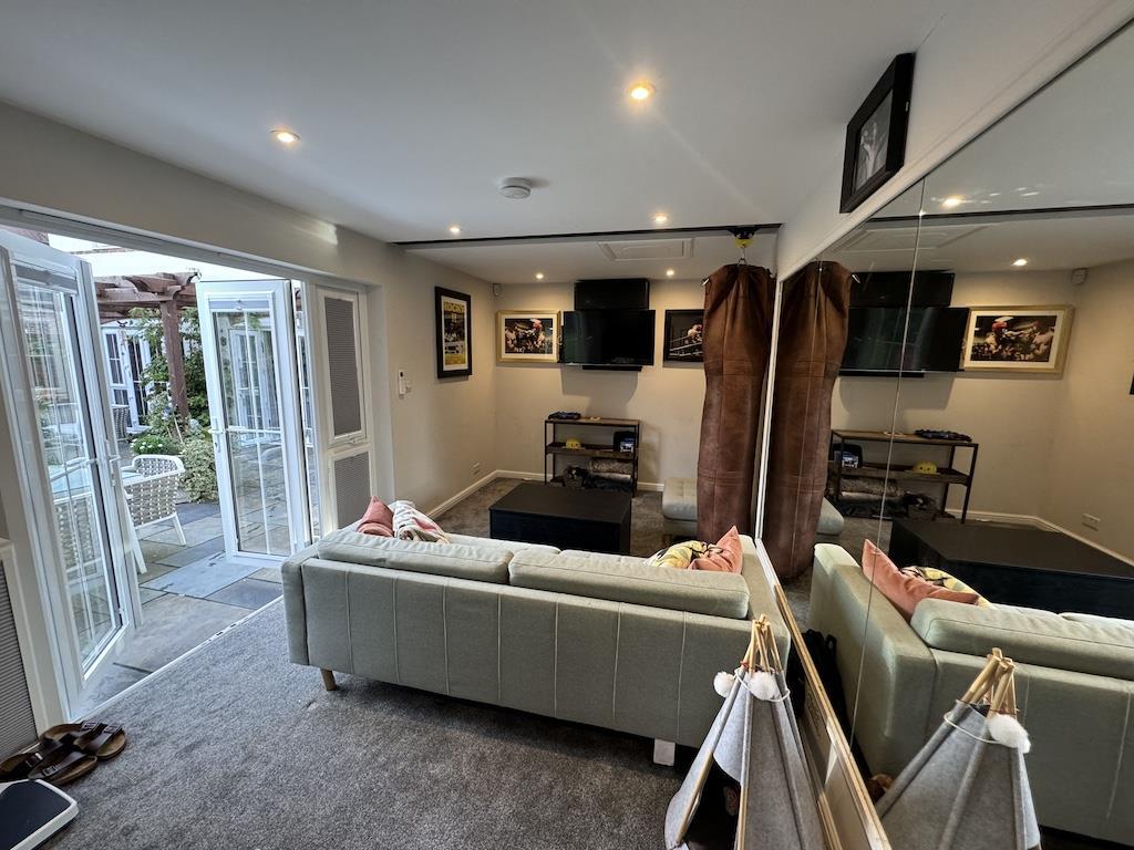 Gym Cinema Room french doors.jpeg