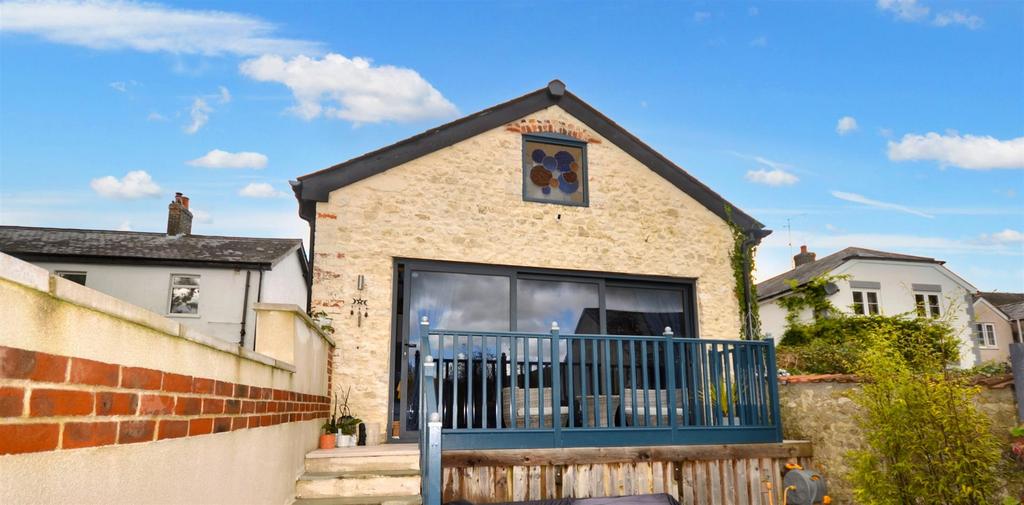 Back garden looking at house.png