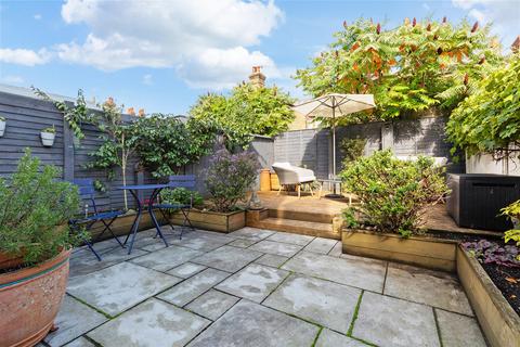 8 Warren Road, London, SW19 2HX