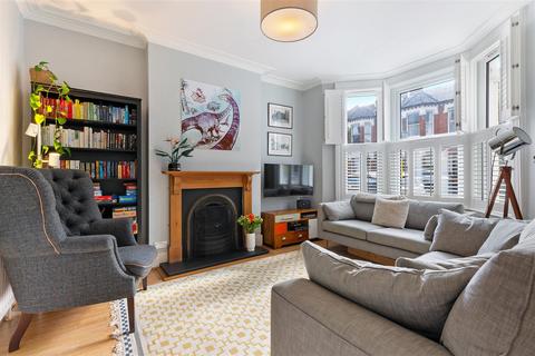8 Warren Road, London, SW19 2HX