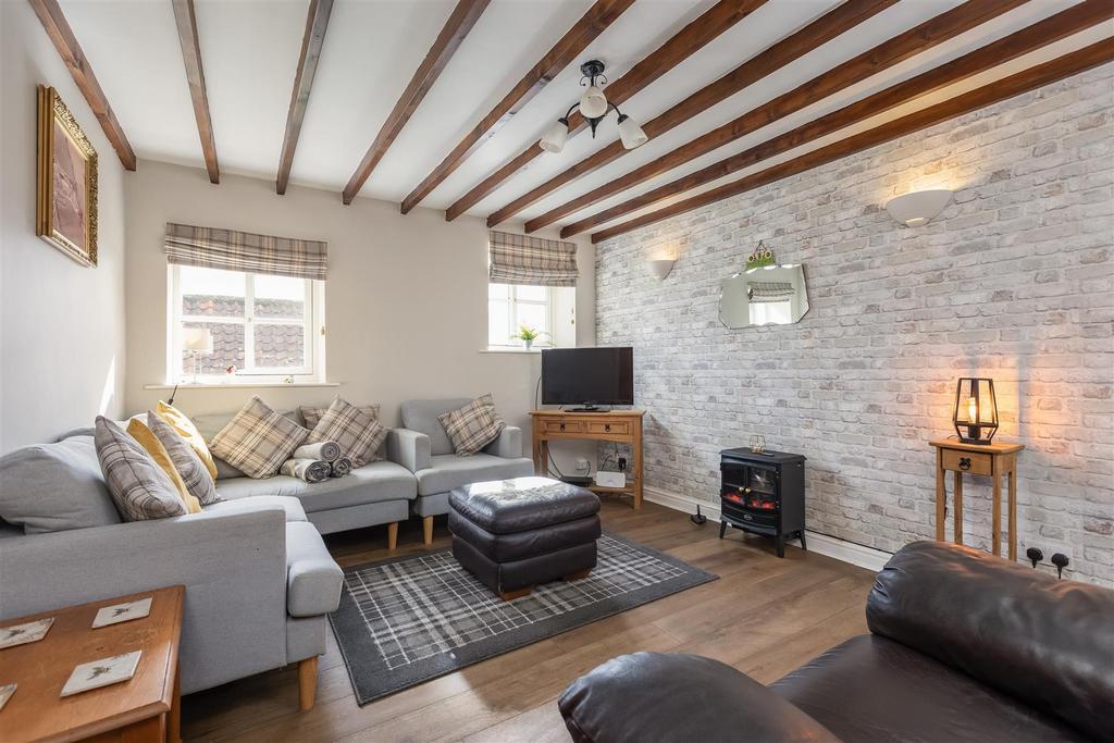 Breck House Farm Bungalow Sitting Room-2.jpg