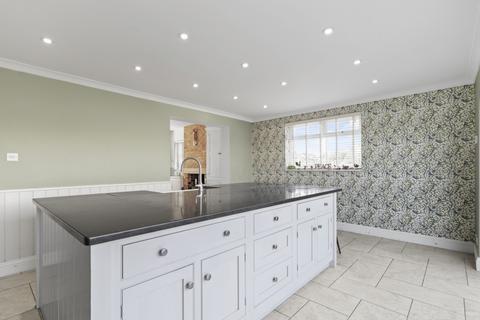 13 Thrapston Road, Finedon, Wellingborough, NN9 5DG