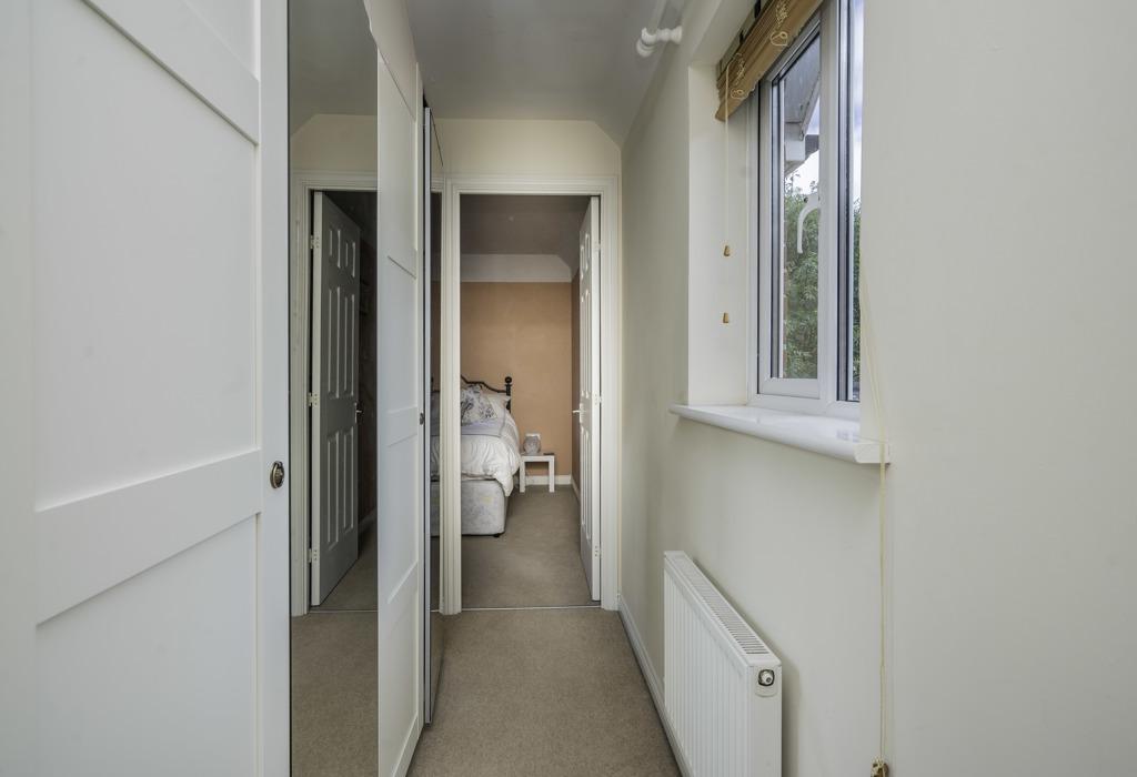 Hallway to third bedroom