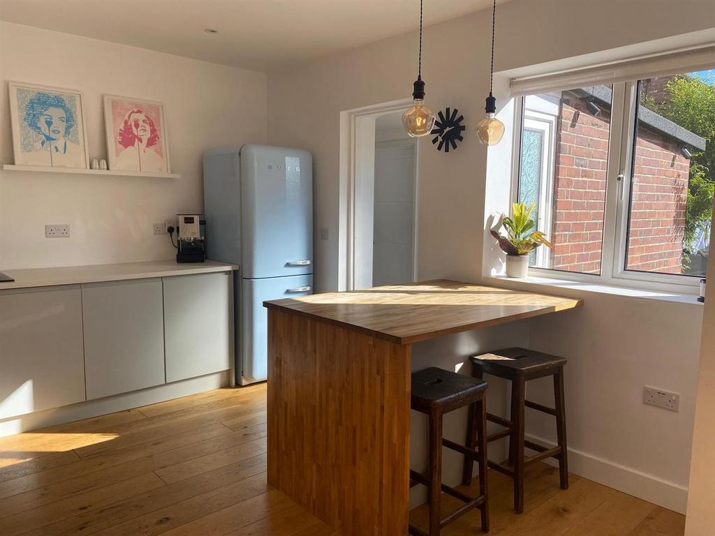 Kitchen towards rear lobby.jpg