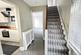 Stairs rising to First Floor