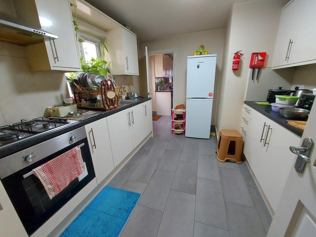 Three Bedroom Mid Terraced House