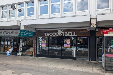 Retail property (high street) to rent, 233 High Street, Guildford Surrey, GU1 3AJ