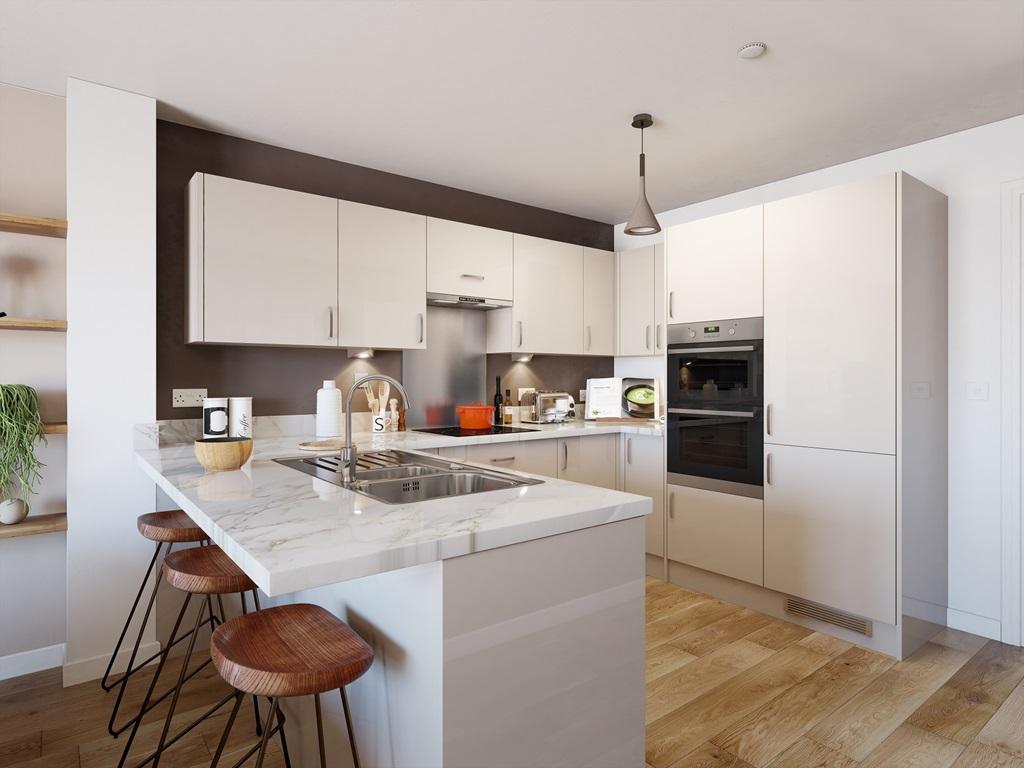 The kitchen features a handy breakfast bar