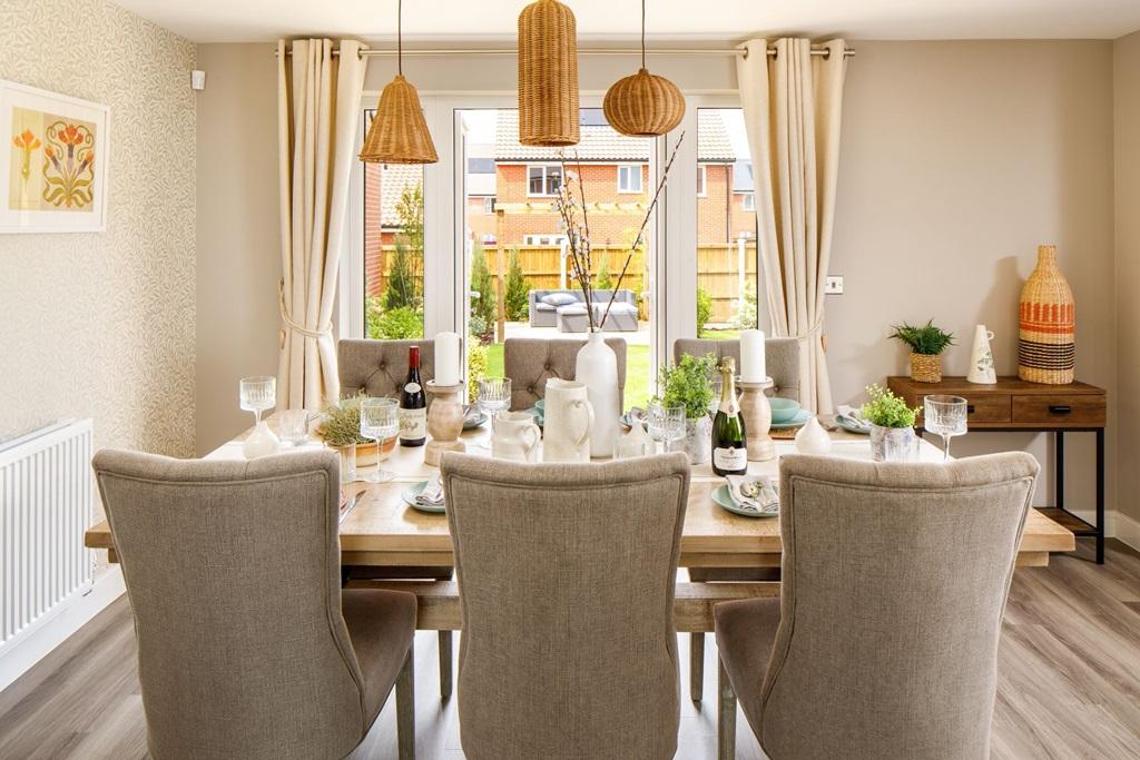 Your dining area looks over your garden through...