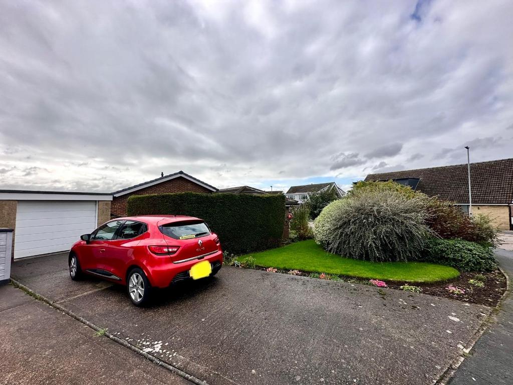 Detached garage and driveway