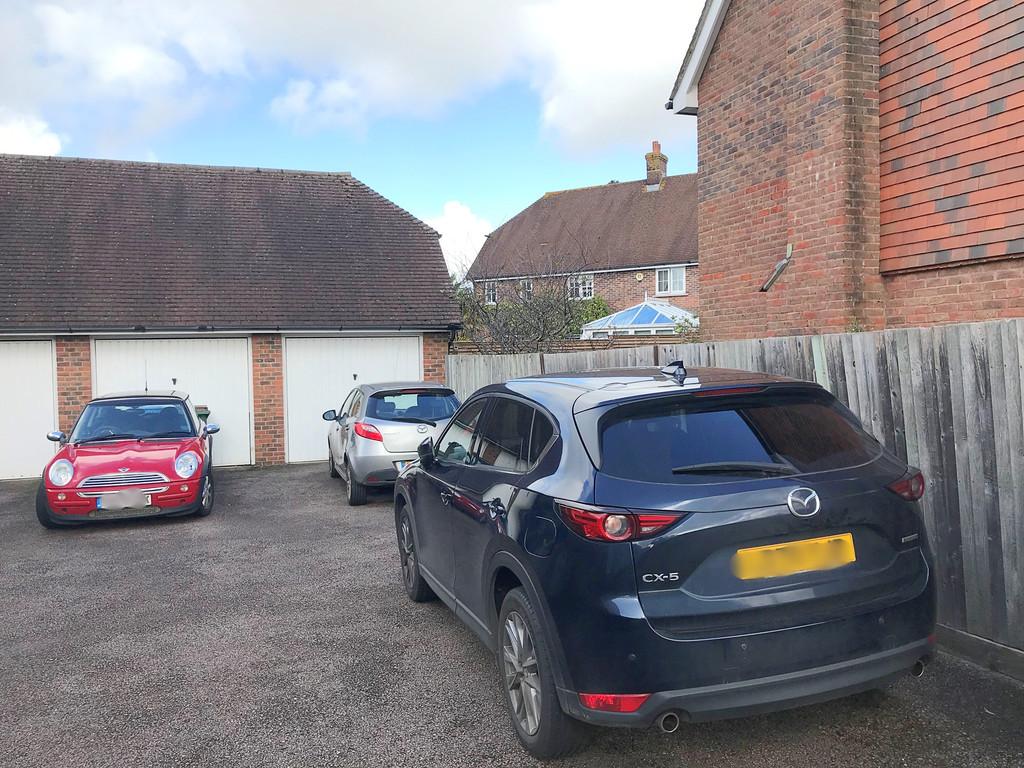 Garage and drive landscape